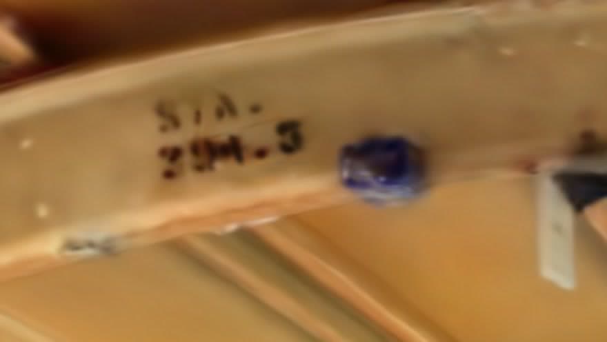 Detail from the scan: a station marking on a fuselage frame