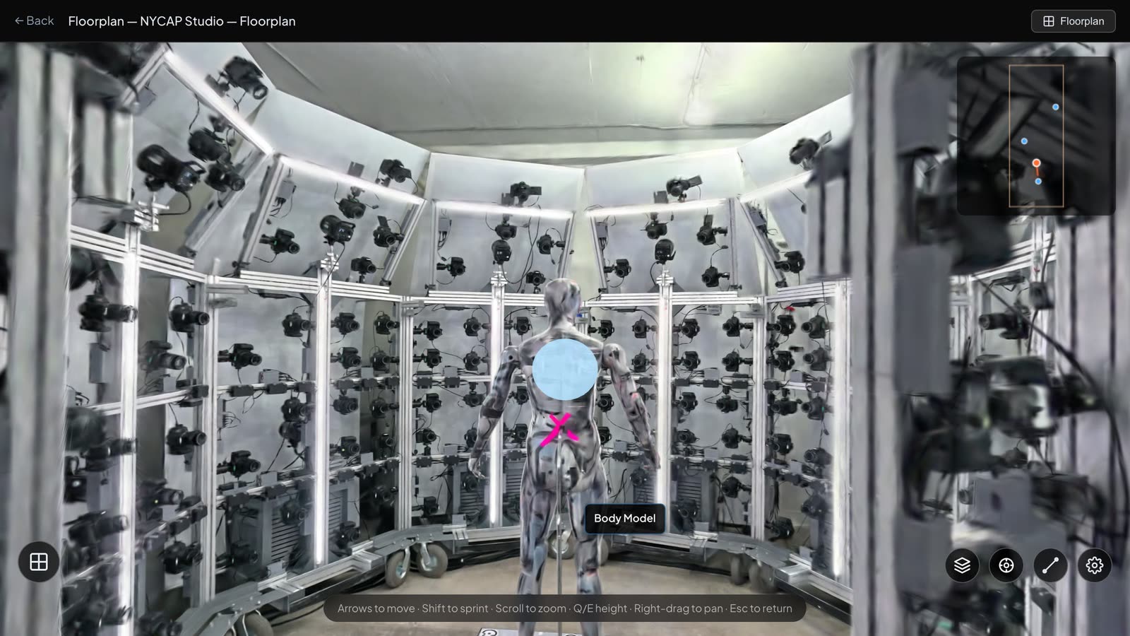 Inside a capture rig, with the figure marked