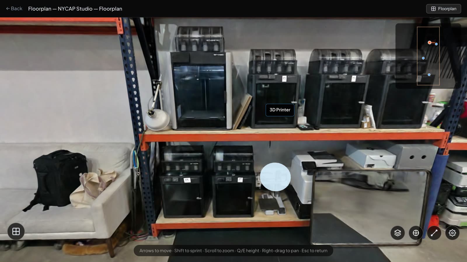 In front of the 3D printers on the racking